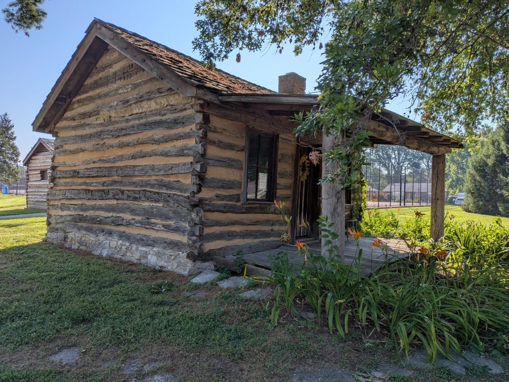 The Cougot Log Cabin, built in 1840, at Tower Court Park on New Florissant Road.